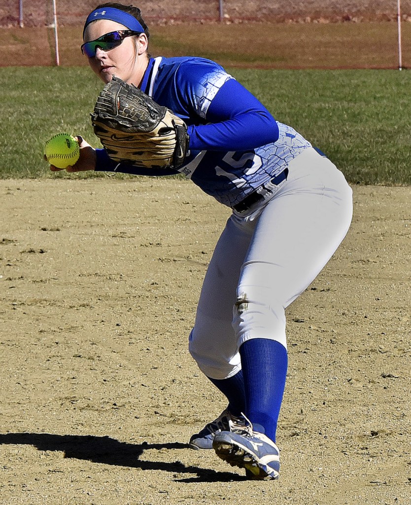 Madison's Marah Hall throws to first base after fielding a line drive during a Mountain Valley Conference game against Hall-Dale on Monday in Farmingdale.