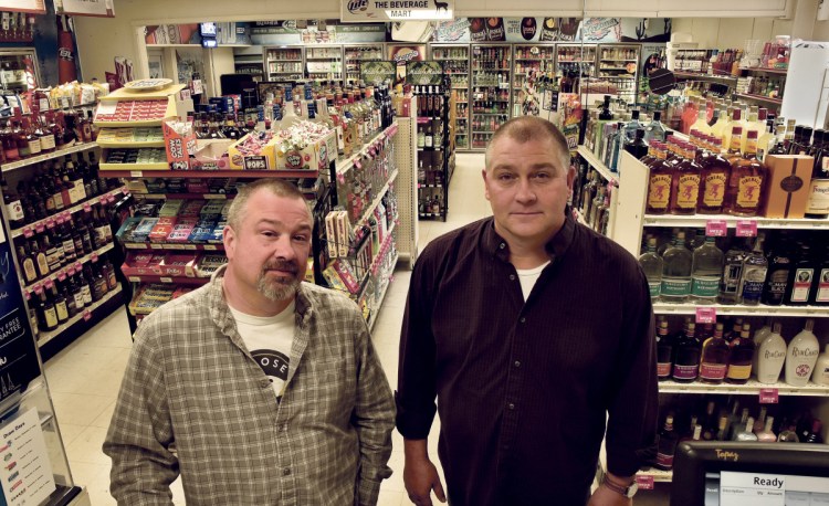 The Damon family owns seven stores in the area, including The Beverage Mart in Skowhegan, where Rusty Damon, left, and Jeff are pictured Thursday. The family has been awarded the 2017 Business Person of the Year by the Mid-Maine Chamber of Commerce.