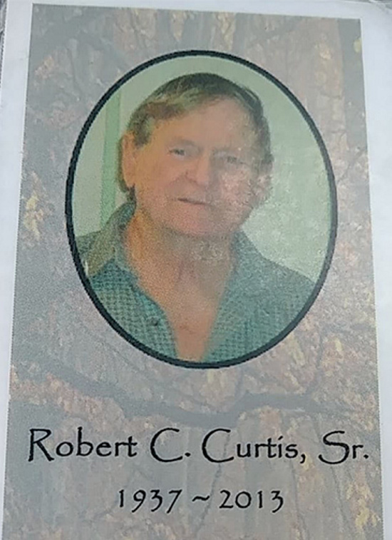 A memorial funeral card for Robert C. Curtis Sr.