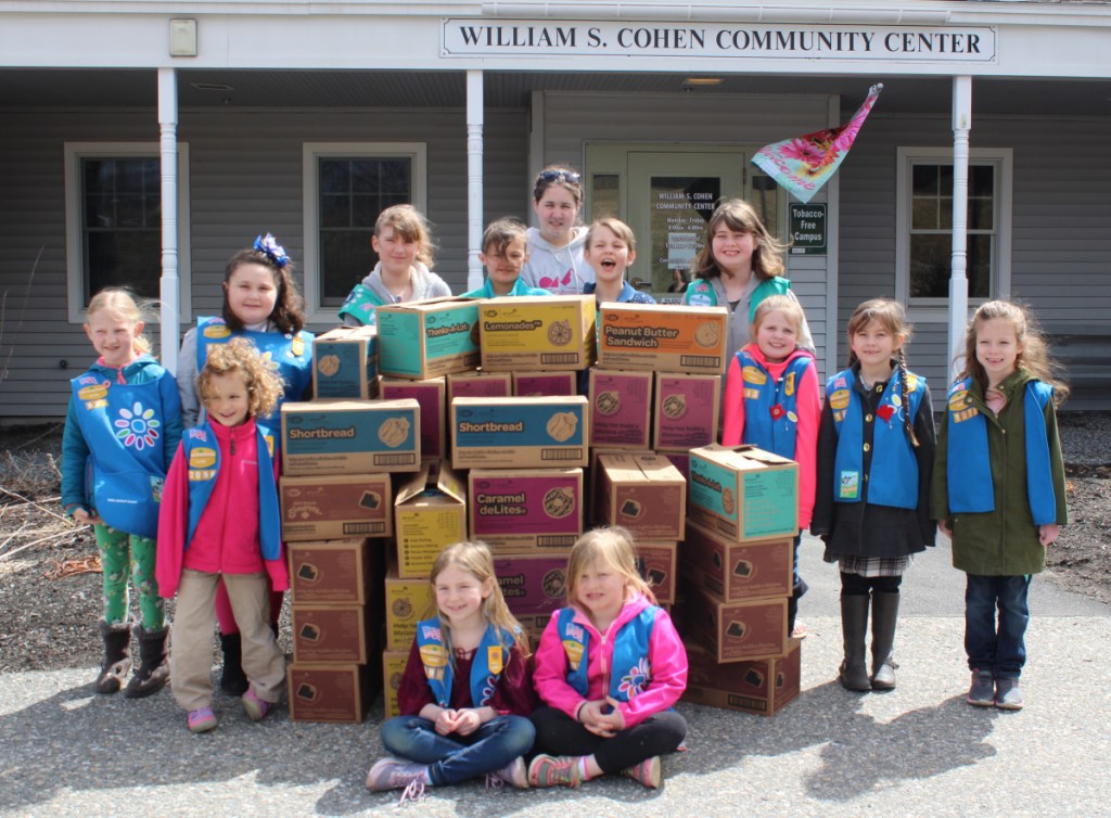Girl Scouts  from the Cobbossee Service Unit recently delivered more than 50 cases of donated cookies to the Meals on Wheels program at Spectrum Generations Cohen Community Center in Hallowell. In front, from left, are: Freya Carlson,Troop 696; and Delia Colfer-Troop 696
In back, from left, are: Nora Setchell, Troop 697; Caroline Heck, Troop 2096; Madilynn Irish, Troop 697; Ashlyn Fortin, Troop 753; Ella Setchell, Troop 753; Haley McGrath, Troop 2146; Cadence Smith, Troop 753; Sandi Bolick, Troop 880; Louiselle Marshall, Troop 143; Scarlett Pollard, Troop 143; and Clara Clark, Troop 1075.