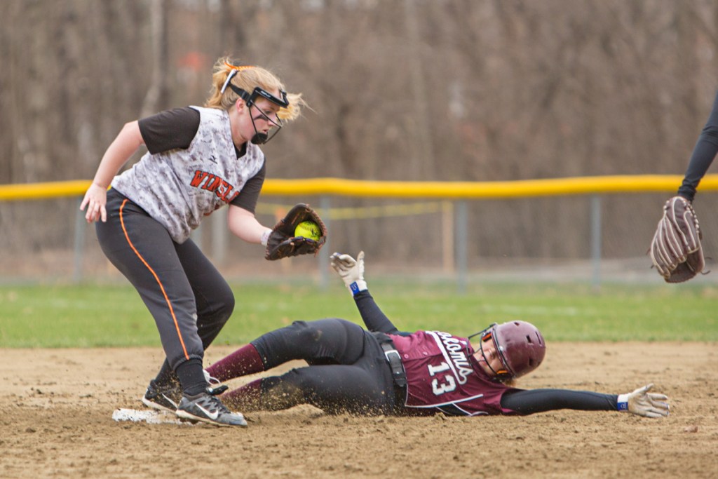 Winslow second baseman Ashley LaChance takes the throw as Nokomis runner Maci Leal slides into second base during a game Friday in Winslow.