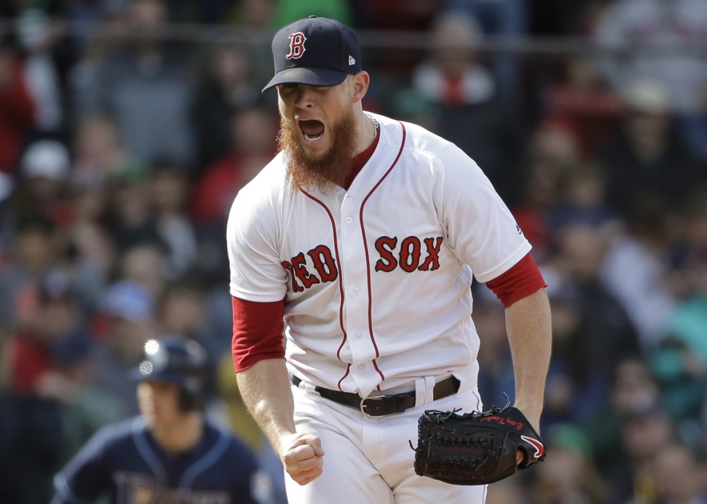 Boston's Craig Kimbrel celebrates after striking out Tampa Bay's Carlos Gomez to end the game Sunday, in Boston.