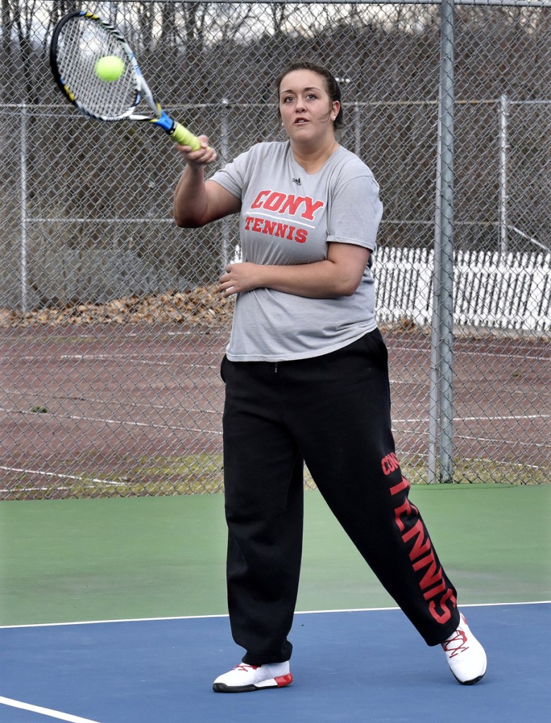 Cony's Melody Harrington returns a shot against Messalonskee on Monday in Belgrade.