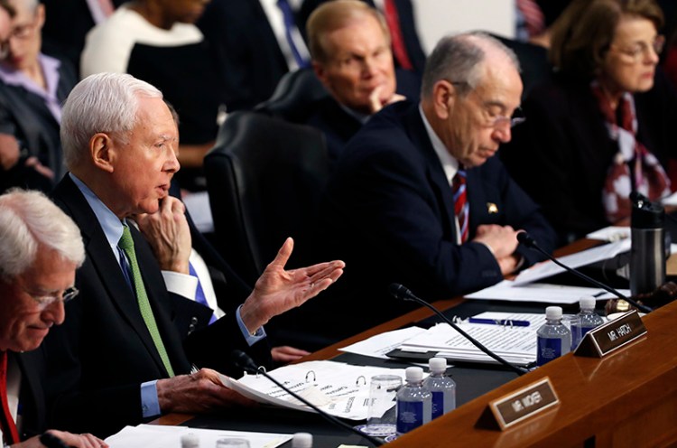 Sen. Orrin Hatch, R-Utah, second from left questions Facebook CEO Mark Zuckerberg during a joint hearing of the Commerce and Judiciary Committees.
