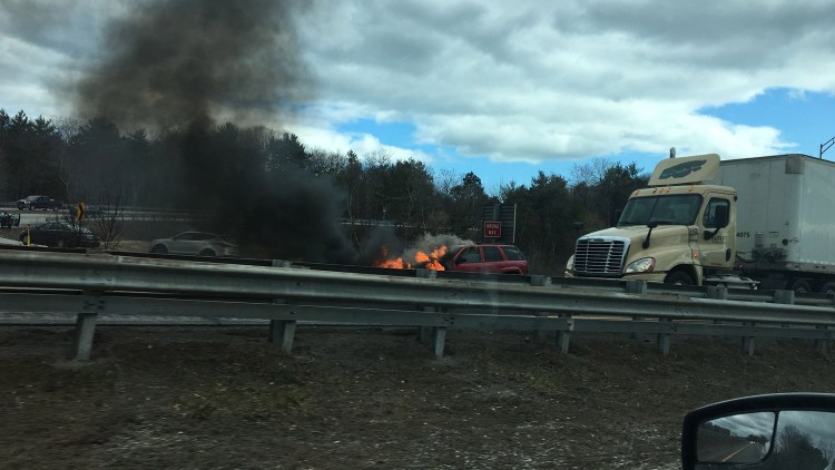 A fire in a car disrupted traffic on Interstate 295 in Freeport on Wednesday.