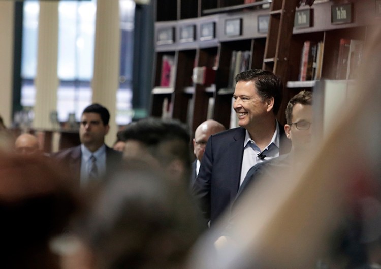 Former FBI director James Comey arrives at a New York bookstore on Tuesday.