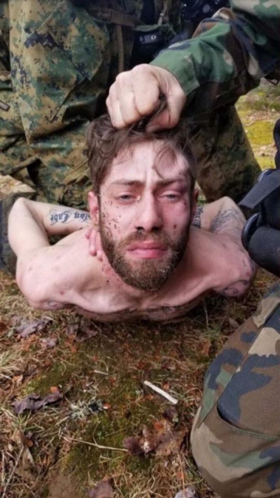 Maine State Police said shooting suspect John D. Williams was uncooperative so they had to hold him in place for this photo during his arrest Saturday. A reader says it seemed more like a vengeful act.