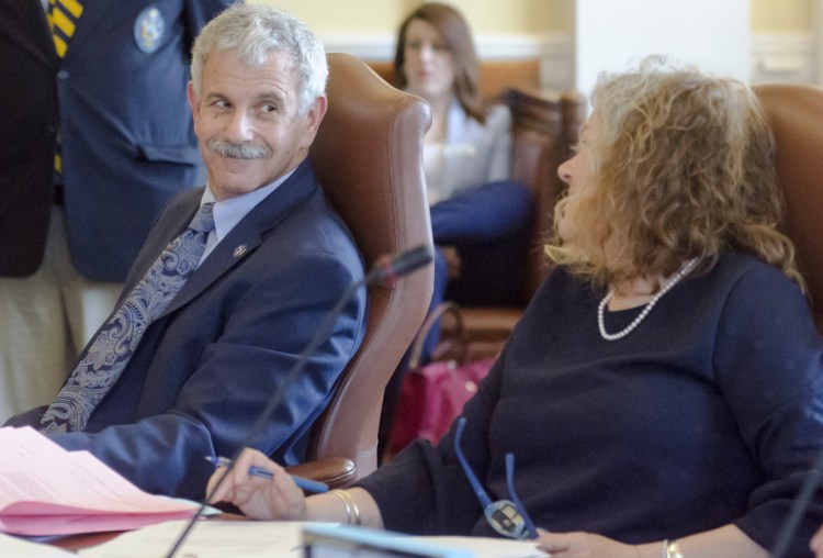 Republican Sen. Roger Katz, left, and Sen. Kimberly Rosen, R-Bucksport, members of the Legislature's Marijuana Law Implementation Committee, react Wednesday as the Senate votes to override Gov. Paul LePage's veto of the adult-use pot bill that came out of the panel.