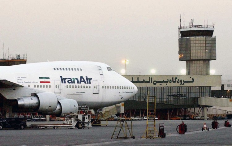 A Boeing 747 of the state carrier IranAir is seen  in 2003 at Mehrabad International Airport in Tehran.  Boeing owes Iran 110 new aircraft, but has slow-walked delivery because of uncertainty around the Iran nuclear deal. Associated Press/Hasan Sarbakhshian