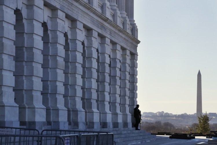 A Capitol Police officer guards his post on Capitol Hill in Washington in January. The U.S. Capitol Police are among the seven winners of this year's Jefferson Muzzles, tongue-in-cheek awards bestowed annually by a free-speech group. The Charlottesville, Virginia-based Thomas Jefferson Center for the Protection of Free Expression announced the "winners" on Sunday.