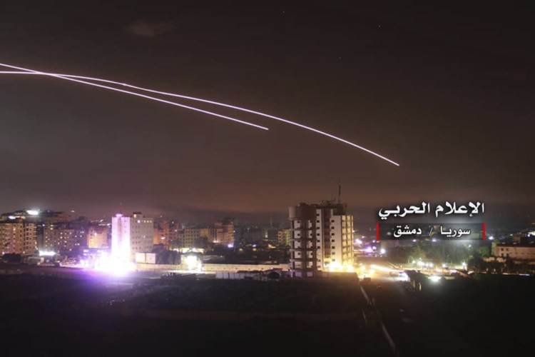 Israeli missiles rise into the sky as they head for air defense positions and other military bases, in Damascus, Syria, in a photo provided Thursday. The Israeli military on Thursday said it attacked "dozens" of Iranian targets in neighboring Syria in response to an Iranian rocket barrage on Israeli positions in the Golan Heights.