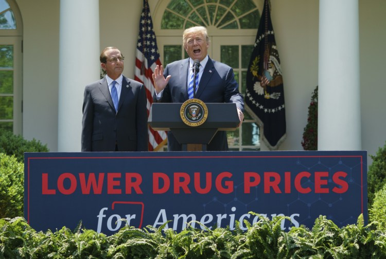President Trump speaks during an event about prescription drug prices with Health and Human Services Secretary Alex Azar in the Rose Garden of the White House in Washington on Friday.