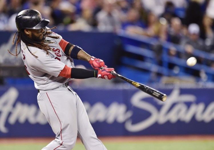 Red Sox's Hanley Ramirez hits a two-run home run in the third inning of Boston's 5-2 win over the Blue Jays on Saturday in Toronto.