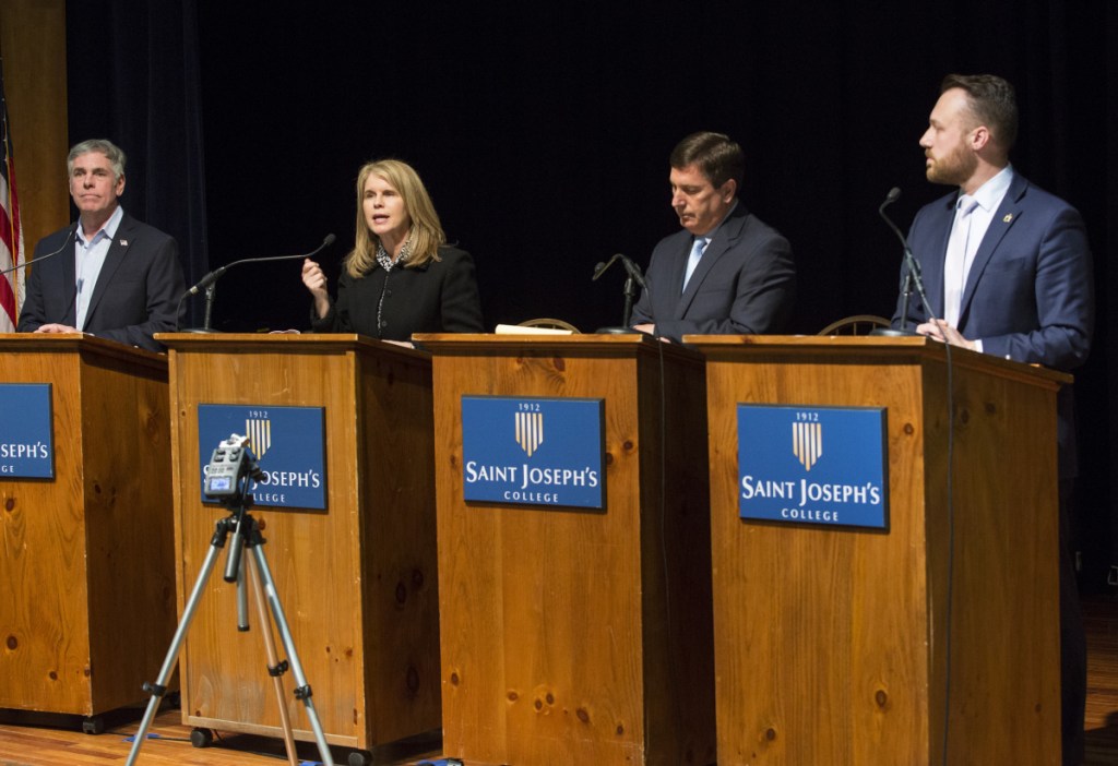 The Republican gubernatorial candidates for 2018 – from left, businessman Shawn Moody of Gorham; former Health and Human Services Commissioner Mary Mayhew of South China; House Minority Leader Ken Fredette of Newport; and Senate Majority Leader Garrett Mason of Lisbon – participate in a forum at St. Joseph's College in Standish.
