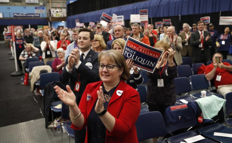 Maine State Rep. Stacey K. Guerin, R-Glenburn, applauds U.S. Rep. Bruce Poliquin during the Republican Convention on May 5 in Augusta. 