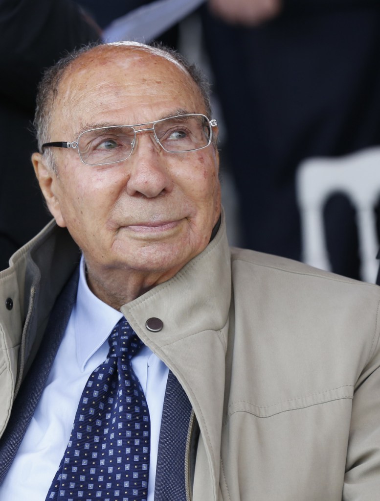 Serge Dassault, chairman and CEO of Dassault Group, is shown attending the Bastille Day parade in Paris in 2014. He died Monday at age 93. 