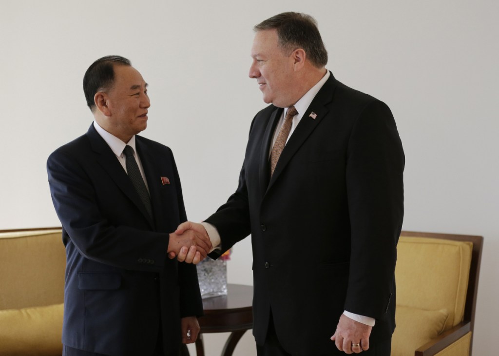 Kim Yong Chol, former North Korean military intelligence chief and one of leader Kim Jong Un's closest aides, shakes hands with U.S. Secretary of State Mike Pompeo during a meeting Thursday in New York.