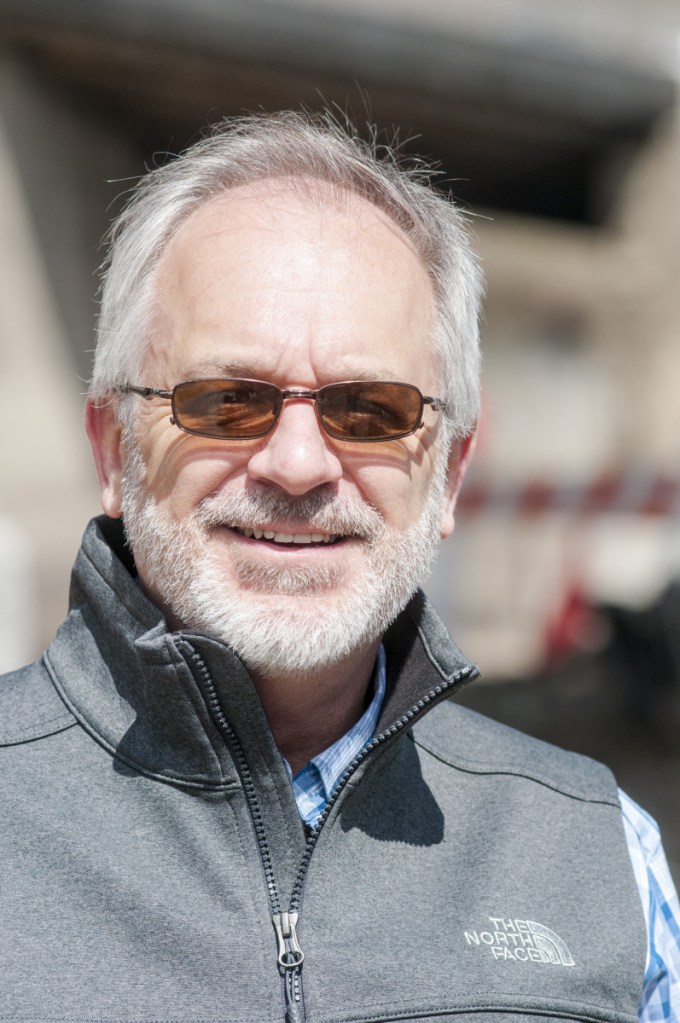 David Braley talks about the Kennebec River Rail Trail expansion project Tuesday near the 0.25-mile marker sign under Memorial Bridge in Augusta.