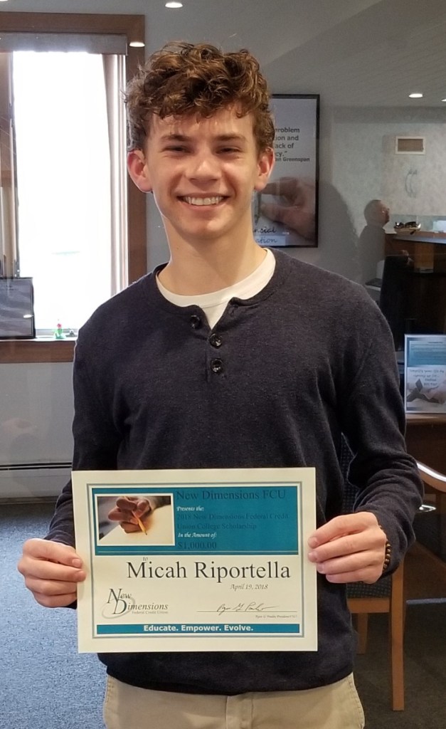 Micah Riportella received his New Dimensions Federal Credit Union scholarship certificate on April 26.