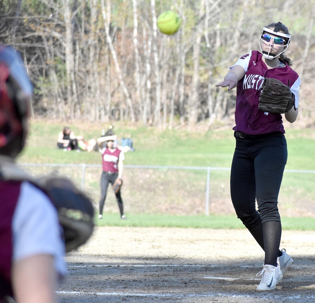 Monmouth pitcher Emily Chasse delivers to home plate during a game at Winthrop Monday afternoon.