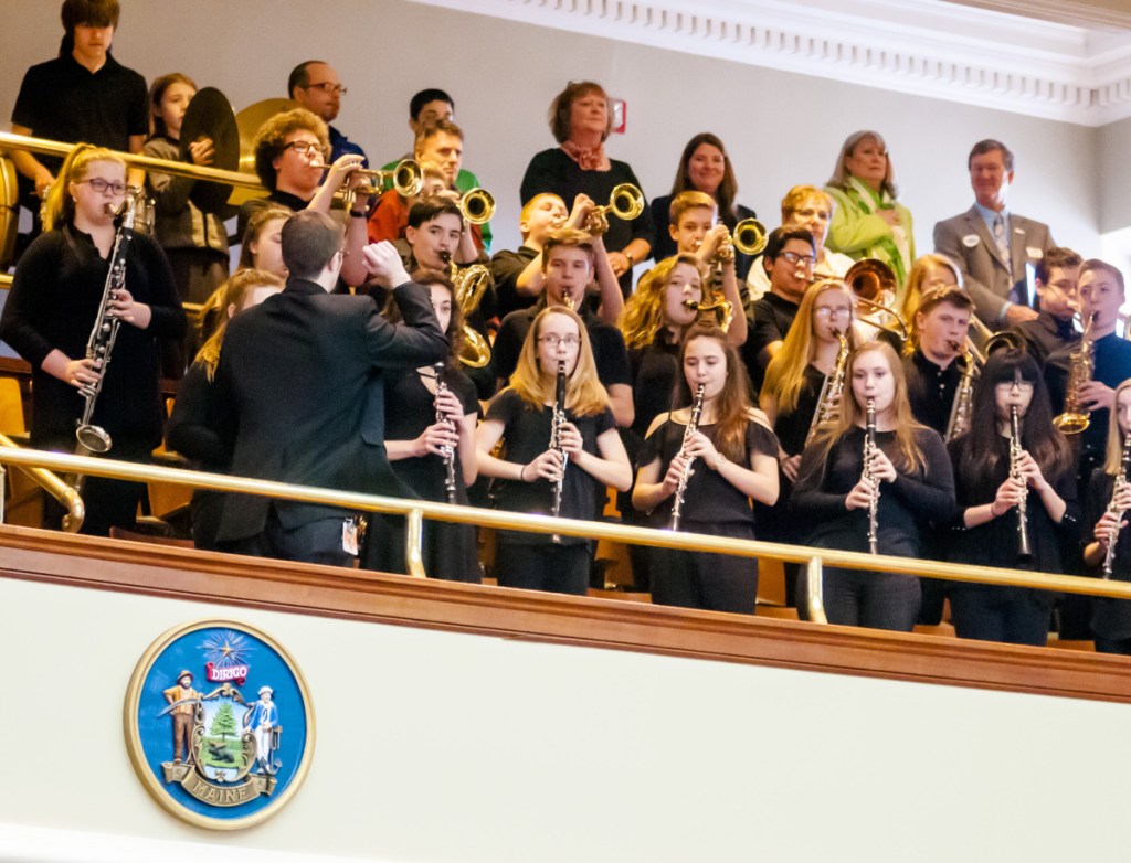 Band director Ben Clark leads the 32-member Winslow Junior High School Concert Band as it plays the national anthem April 13 to open the Maine House of Representatives morning session in the Maine State House in Augusta. The stage in the high school's auditorium in Winslow cannot accommodate the band and all its equipment, and a current renovation plan school officials are of developing would be expected to provide adequate space.