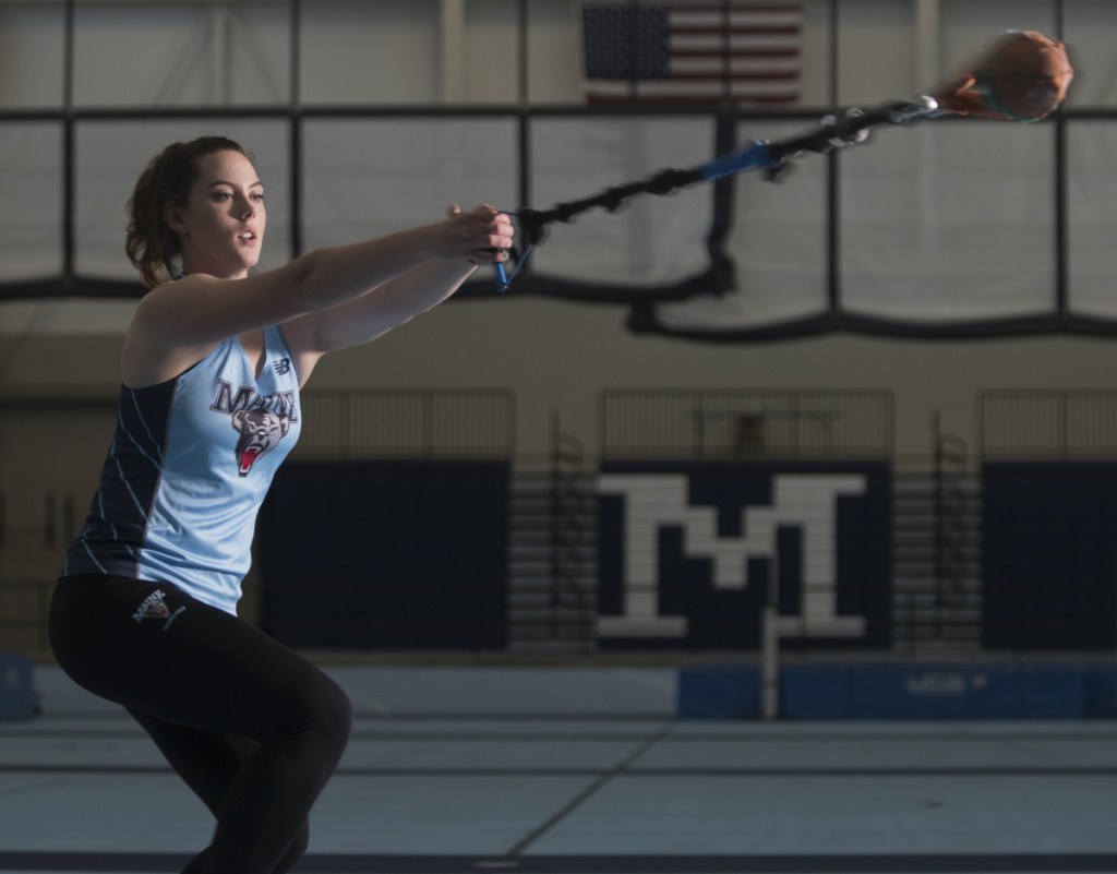 University of Maine senior and Waterville native Rachael Bergeron demonstrates her practice style in the field house in Orono. Bergeron won the America East Conference title in the hammer throw last week and will compete at the New England championship this weekend.