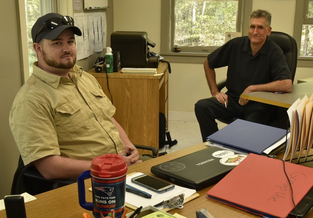 Lake George Regional Park resource manager Justin Spencer, left, and chief administrator Darryll White sit in the park headquarters office  ednesday in Canaan. White says Spencer's organizational skills and leadership experience fit well with his qualities as an initiator and visionary.