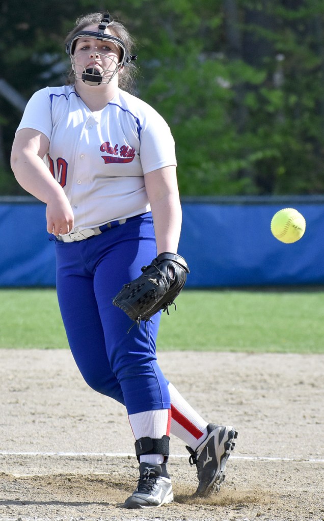 Oak Hill starting pitcher Molly Flaherty tracks her pitch during a win over Hall-Dale on Wednesday in Wales.