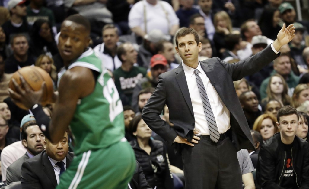 In this April 20 photo, Boston Celtics head coach Brad Stevens reacts during the first half of Game 3 of a first-round playoff series against the Milwaukee Bucks in Milwaukee. The Celtics had the third-best road record during the regular season but have just one road victory so far in the playoffs. Boston's youngsters acknowledged being "shell-shocked" in the first round when that series shifted to Milwaukee. They want to emulate their approach from last series against Philadelphia when they were able to put the Sixers in a 3-0 hole.
