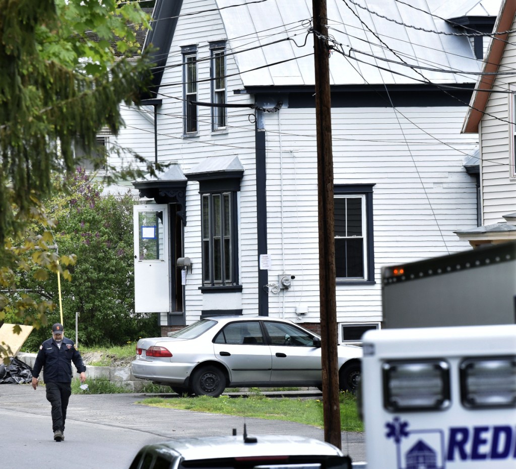 An investigator leaves 15 Summer St. in Skowhegan on Sunday while police were dealing with resident Philip Ewing and explosive-making materials found in the home.