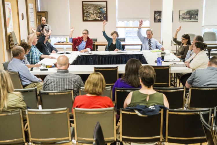 The Waterville City Council votes unanimously May 8 to hold a special municipal election to recall Mayor Nick Isgro during a budget workshop in the council chamber at The Center. The council plans to meet Tuesday to discuss proposed budget items.