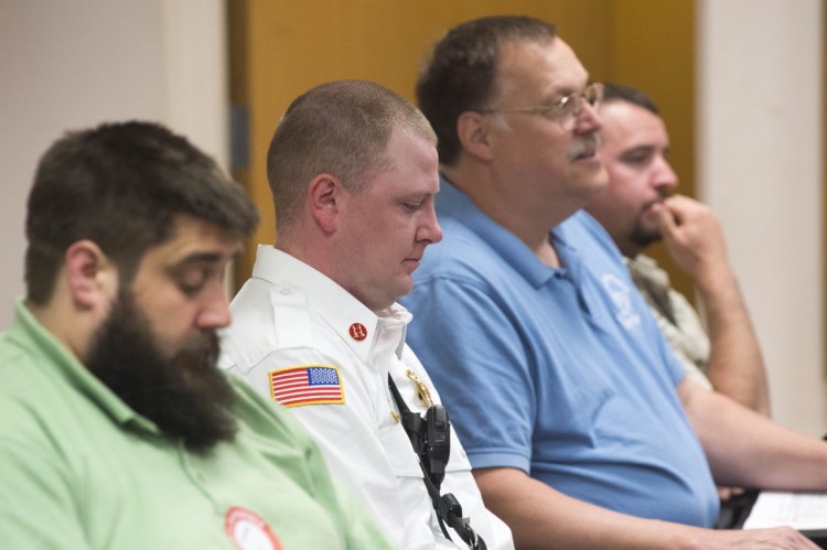 Waterville fire Captain Shawn Esler, second from left, sits with Chief Dave LaFountain, second from right, during a budget workshop Wednesday at the City Council Chambers at The Center in Waterville. Esler has been named new fire chief and will take over when LaFountain retires June 30.