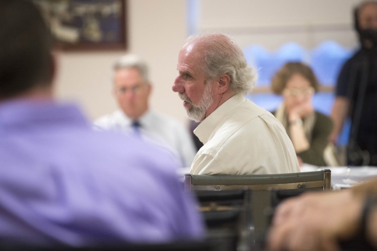 Jim Wood, center, transportation development coordinator for KVCAP, answers questions Tuesday during a budget workshop at the City Council Chambers at The Center in Waterville.