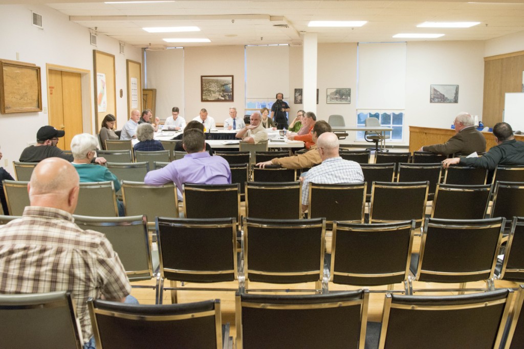 Residents listen during a budget workshop Tuesday at the City Council Chambers at The Center in Waterville.