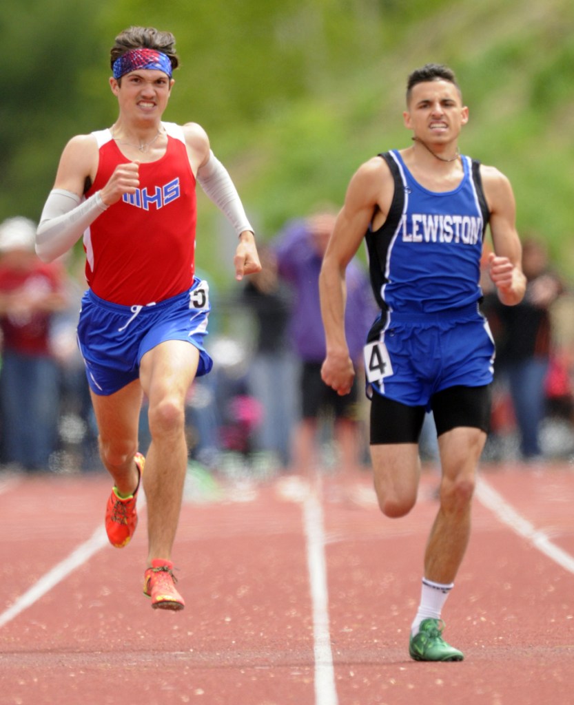Messalonskee's Zach Hoyle, left, and Lewiston's Ethan Solis sprint to the finish line in the 400 meters during the Class A state track and field meet last year at Massabesic High School in Waterboro.