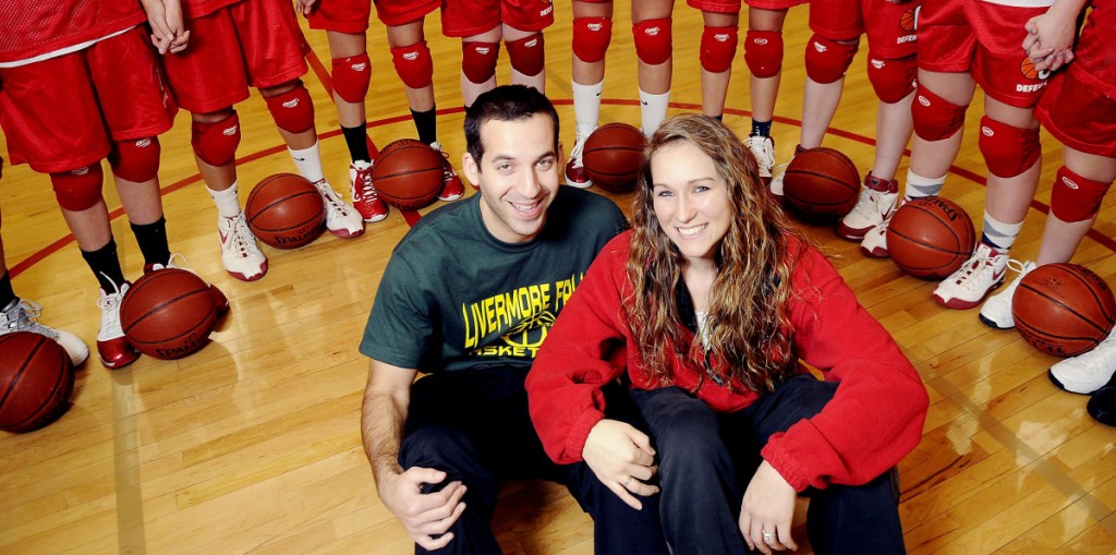 Travis Magnusson poses with his wife, Karen, at Cony High School in January 2011. Magnusson is the new Mt. Blue boys basketball coach.