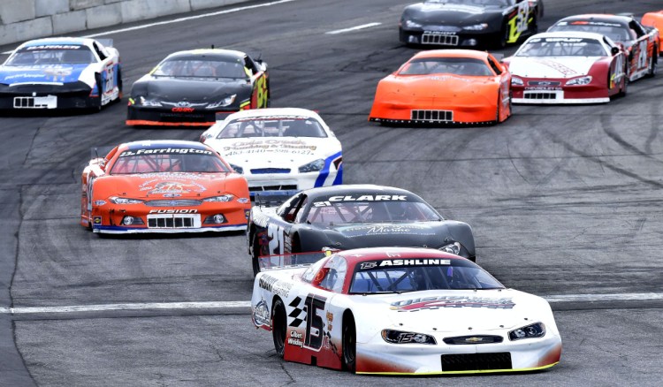 Staff photo by David Leaming 
 Ben Ashline (15) leads the pack during the Coastal 200 race Sunday at Wiscasset Speedway.