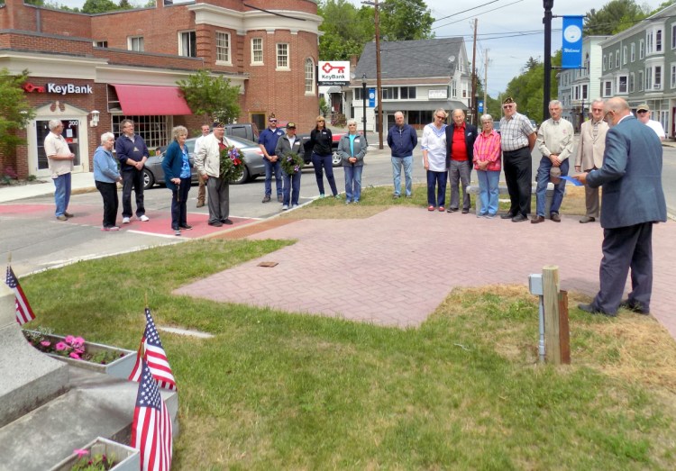 Sunday afternoon, Memorial Day Services were held in Wilton. At right, Rep. Russell Black, R-Wilton, speaks at the monument on Main Street.