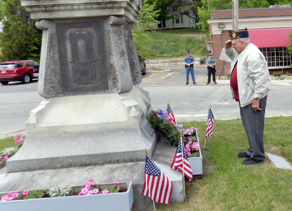 Sunday afternoon, Memorial Day Services were held in Wilton. Korean War veteran Skip Thompson salutes after placing a wreath at the monument on Main Street.