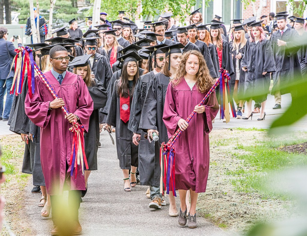 Bates College seniors march onto the quad for their graduation on Sunday morning in Lewiston.