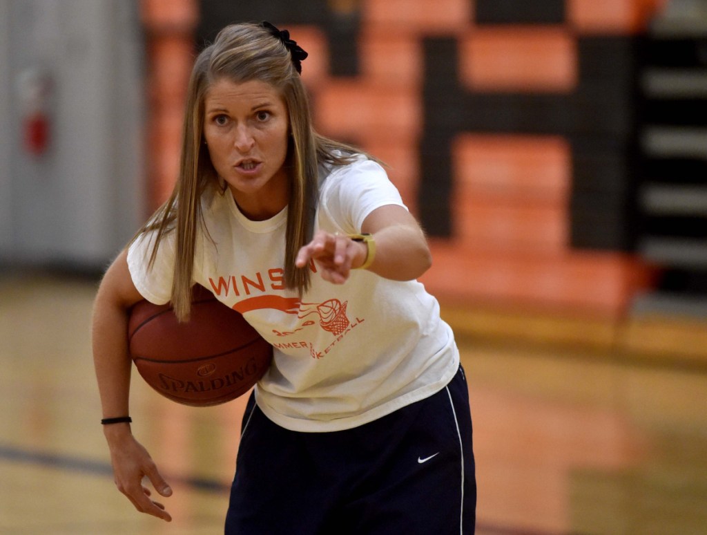 Lindsey Withee, head basketball coach at Winslow High School, works out her players during girls basketball practice at Winslow High School in November of 2016. Withee resigned from her post Wednesday.