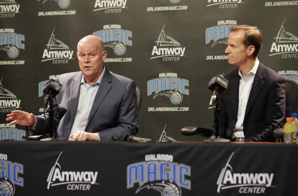 Orlando Magic President of Basketball Operations Jeff Weltman, right, listens as the teams new head coach Steve Clifford answers questions at a news conference Wednesday in Orlando, Florida.