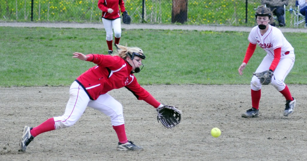 Cony third baseman Alexis Couverette, left, and shortstop Carly Lettre chase a bouncing ball in the infield during a Kennebec Valley Athletic Conference Class A game last season at Cony Family Field in Augusta.