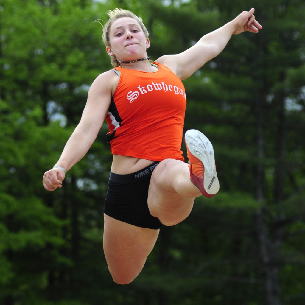 Skowhegan triple jumper Leah Savage gets some air during the Class A state track and field championships last season at Massabesic High School in Waterboro.