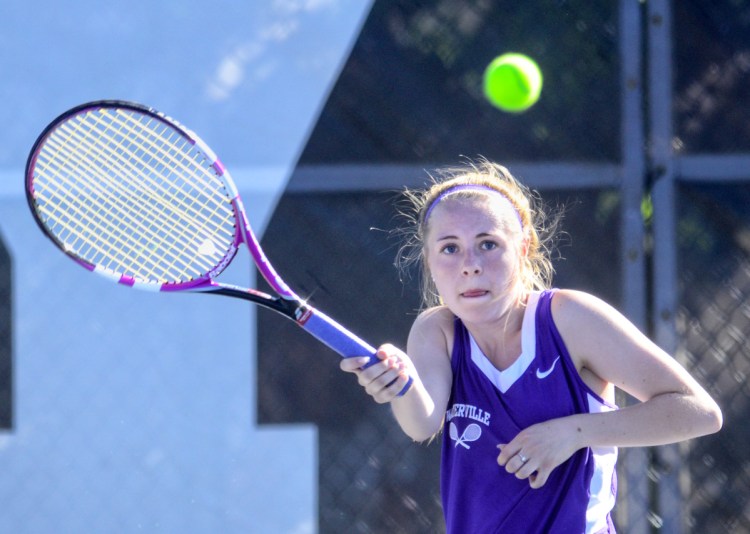 Waterville second singles player Maggie Brock returns a shot during a Class B North quarterfinal match against Erskine on Thursday at Colby College.