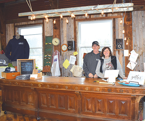 Brett Trefethen and his wife, furniture designer and builder Amy Grant-Trefethen, proprietors of Barn Boards and More. Their shop is filled with treasures large and small, from barn doors to church pews to local railroad spikes now transformed into rustic coat hooks.   He explains: “Every year we dismantle and remove structures of various types and sizes. Our main focus is to target barns that are no longer usable for their intended purpose but still hold lots of potential in their repurpose value. We still strongly believe that barns should be saved. If they cannot be saved, the historical wood should be salvaged and reclaimed for its beautiful appearance and texture. Every timber and board tells a wonderful story of the agricultural history of our state.” Nancy P. McGinnis photo