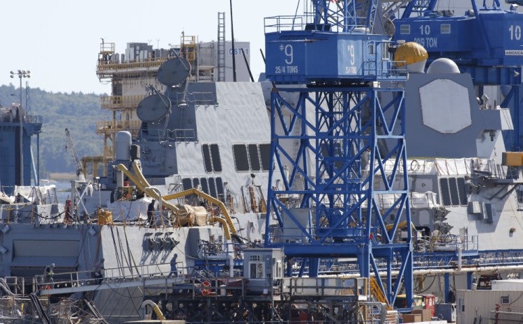 Two Arleigh Burke-class destroyers were tied up at Bath Iron Works' pier in the latter stages of construction in 2016. The yard has won a contract worth $49.8 million initially.