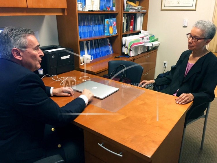 Adine Usher, 78, meets with breast cancer study leader Dr. Joseph Sparano at the Montefiore and Albert Einstein College of Medicine in the Bronx borough of New York last month. Usher was one of about 10,000 participants in the study which showed that women at low or intermediate risk for breast cancer recurrence may safely skip chemotherapy without hurting their chances of survival.