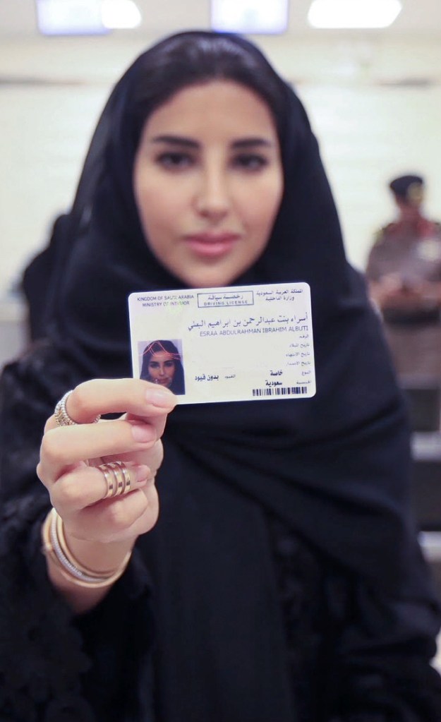 Esraa Albuti displays her brand new driver's license in the Saudi capital, Riyadh.