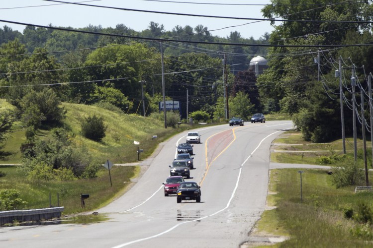 A truck passes several cars on Route 4 in Berwick on Sunday, close to where Saturday's fatal accident happened.